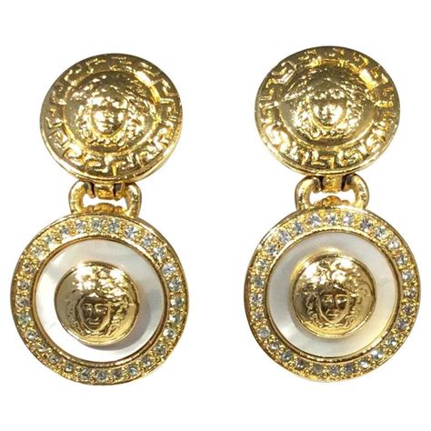 versace silver tone crystal ring|Versace clip on earrings.